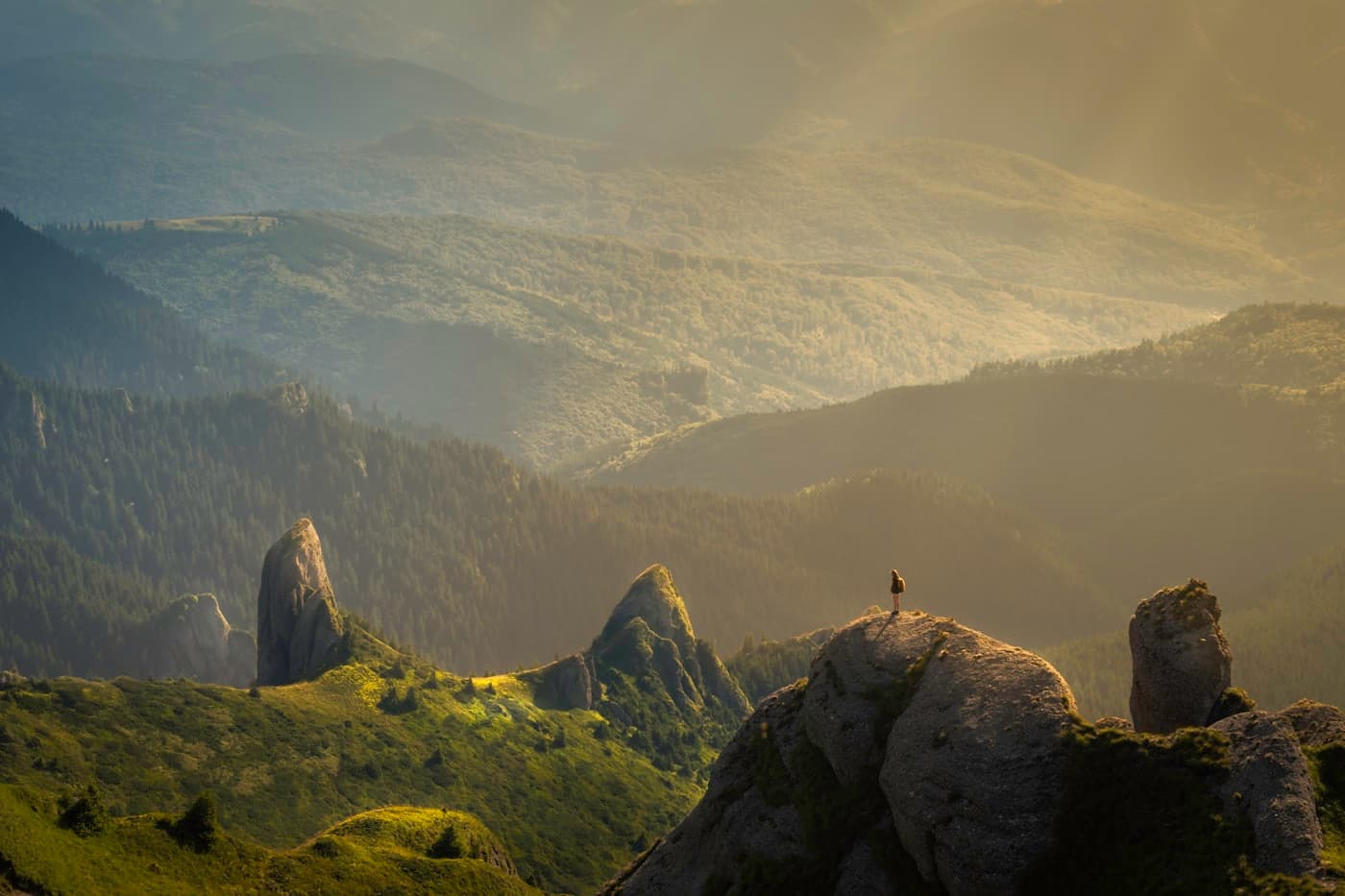 Misty mountains in warm, golden light